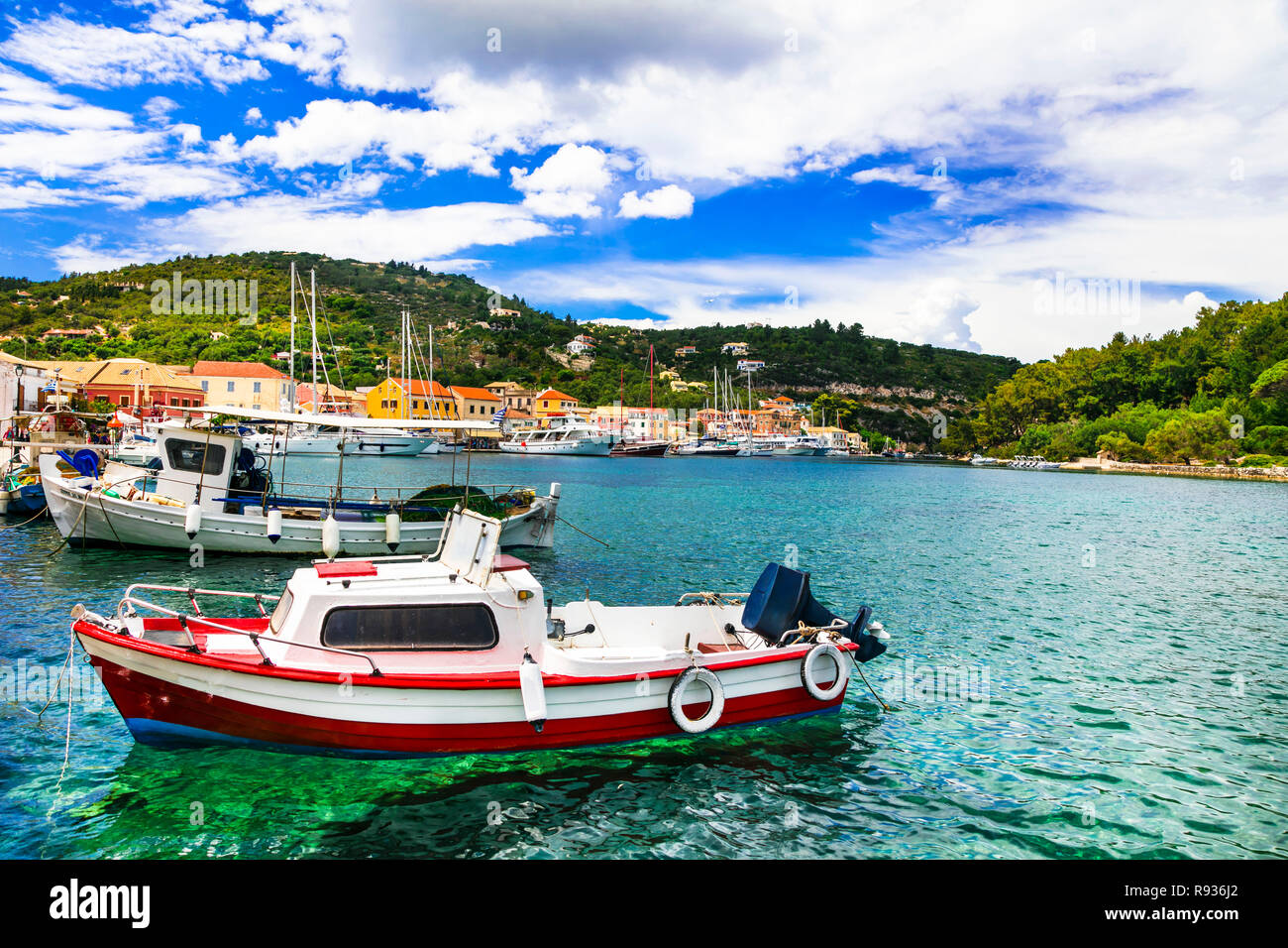 Turquoise sea and traditional boats in Lakka village,Paxos island
