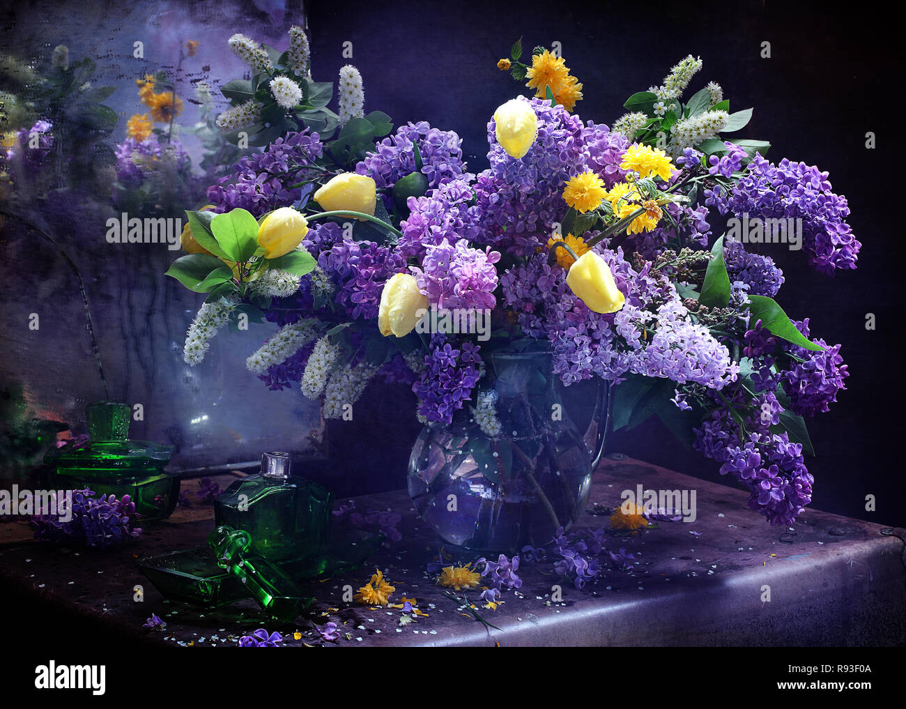 Still life with a bouquet of lilacs Stock Photo - Alamy