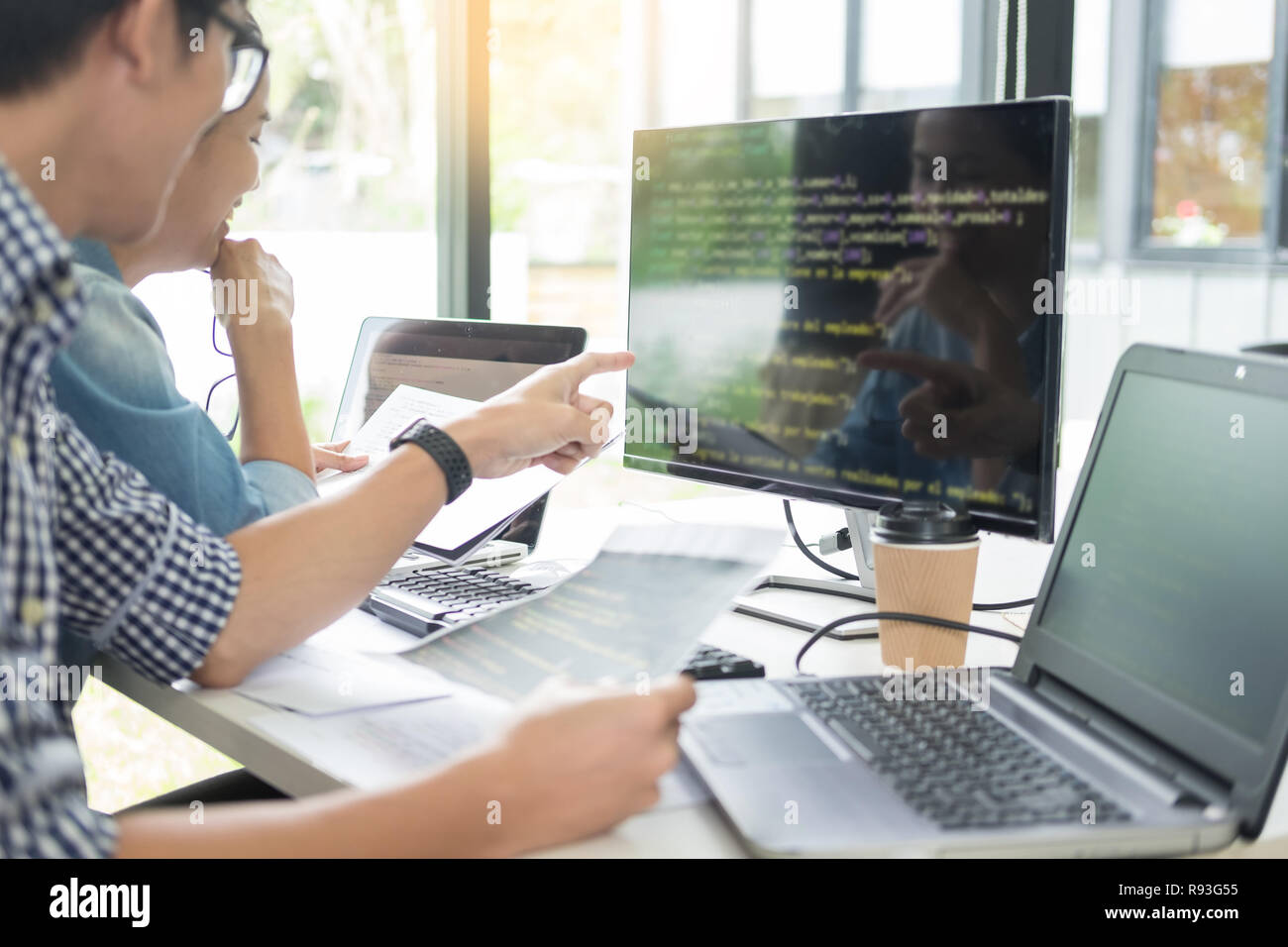 Asian team Outsource Developer Looking Screen Programming Code Working ...
