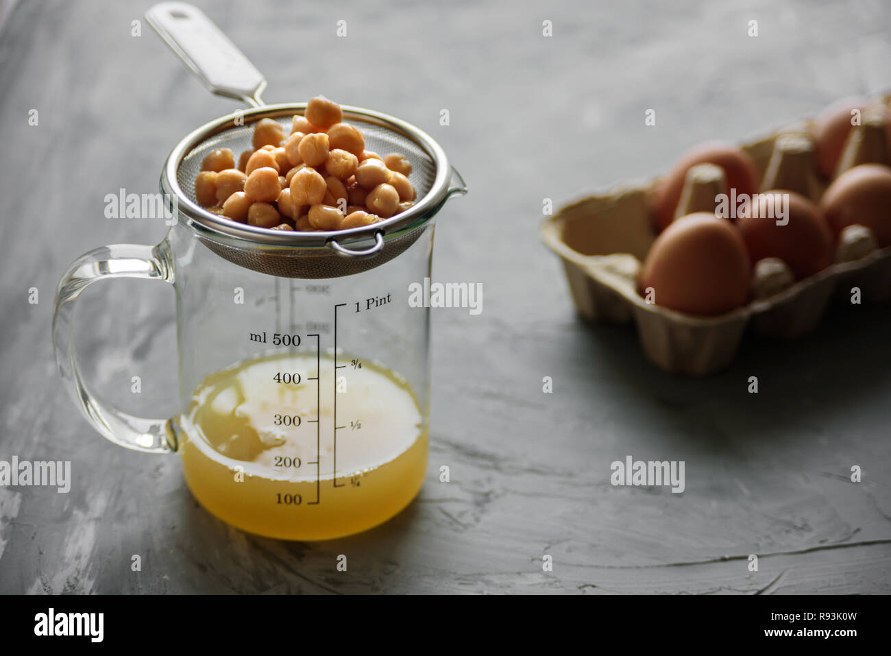 Chickpea water aquafaba with eggs. Egg replacement. Vegan concept Stock Photo