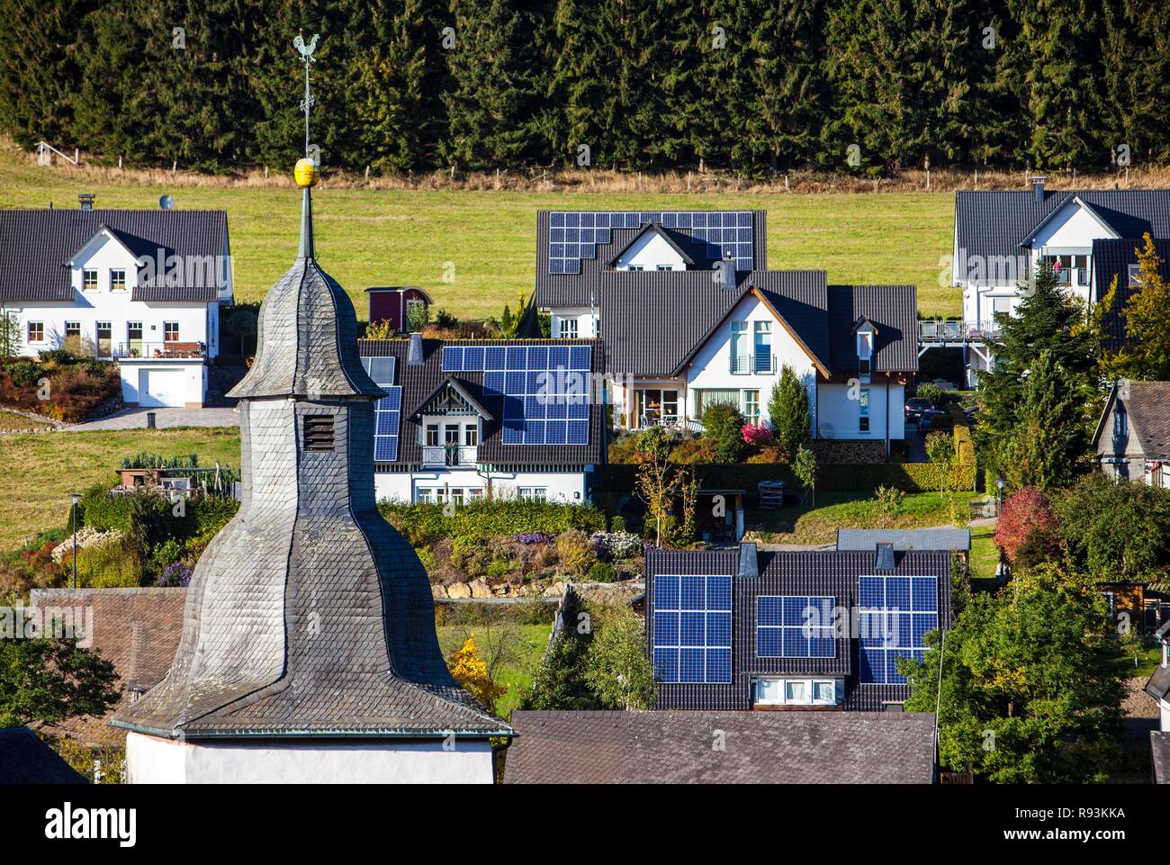 Solar panels on the roofs of residential houses, Oberkirchen, North Rhine-Westphalia Stock Photo