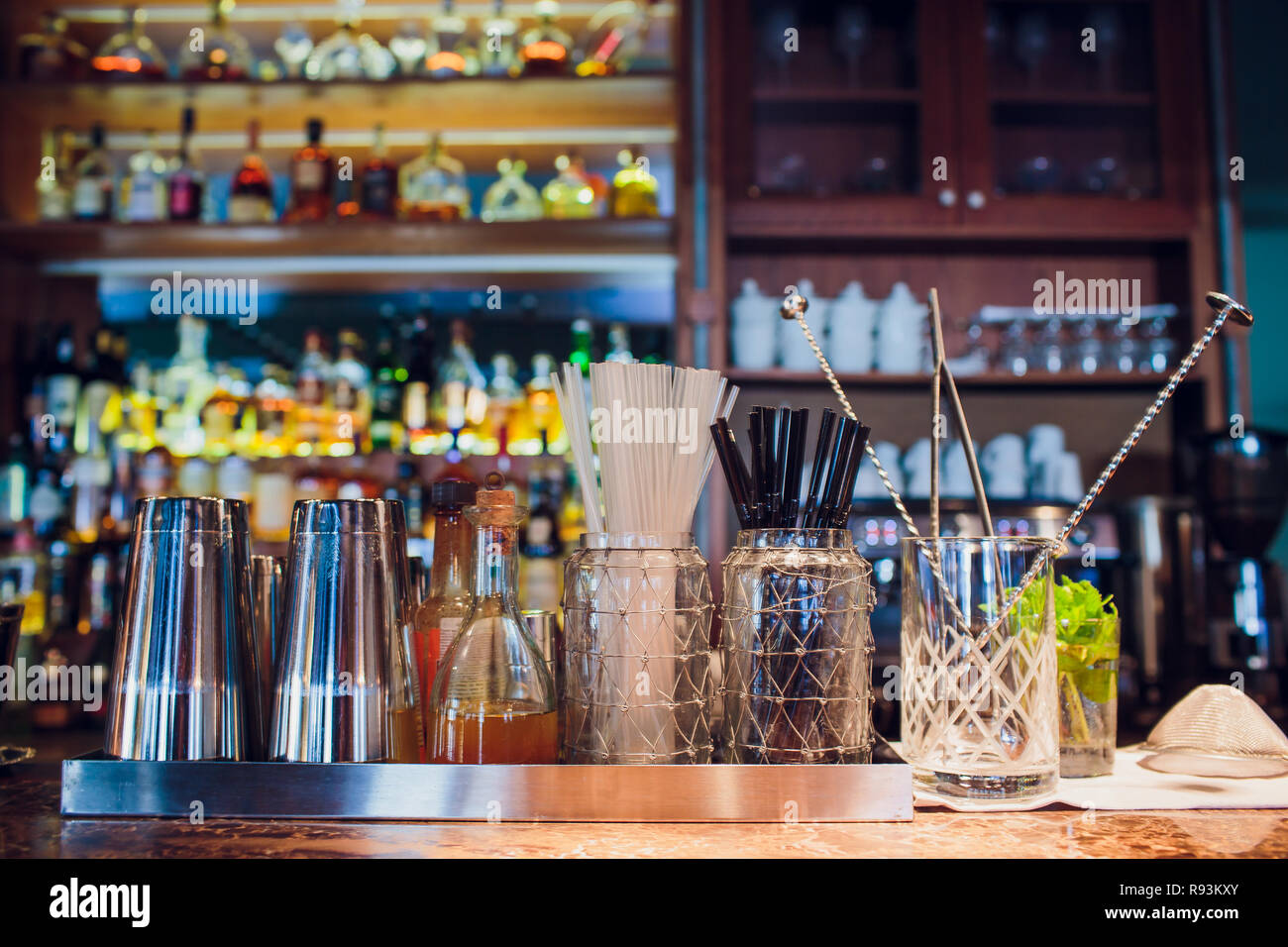 Set of bar accessories for making cocktails located on bar Stock Photo