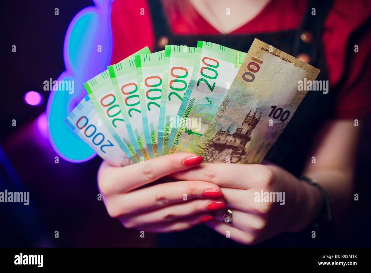 Russian roubles and some new 200 and 2000 roubles bills Stock Photo - Alamy