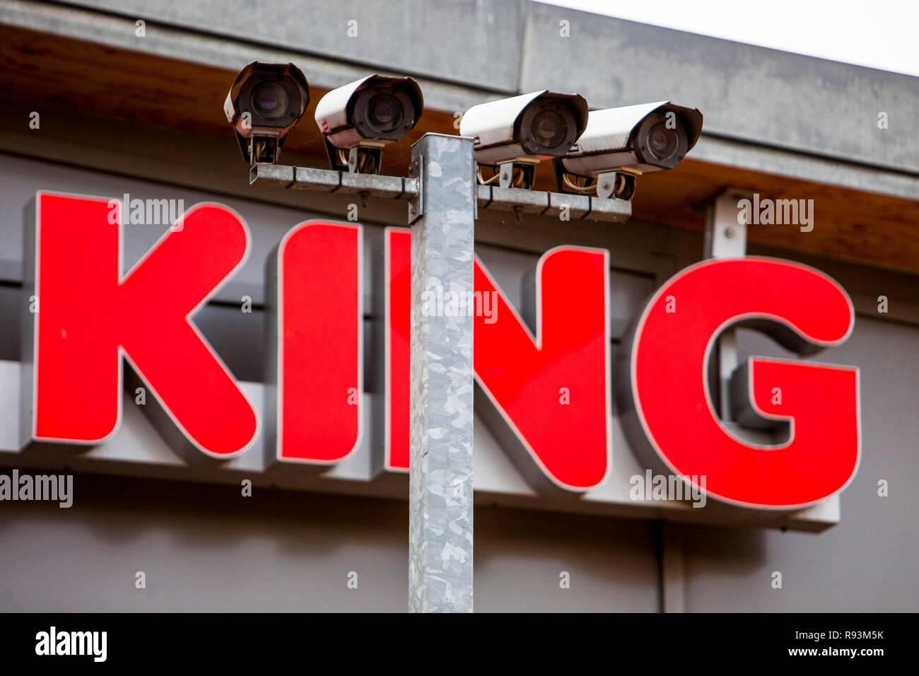 Signage, 'King' with video surveillance cameras in the parking lot of a roadhouse, Dortmund, Ruhr district Stock Photo