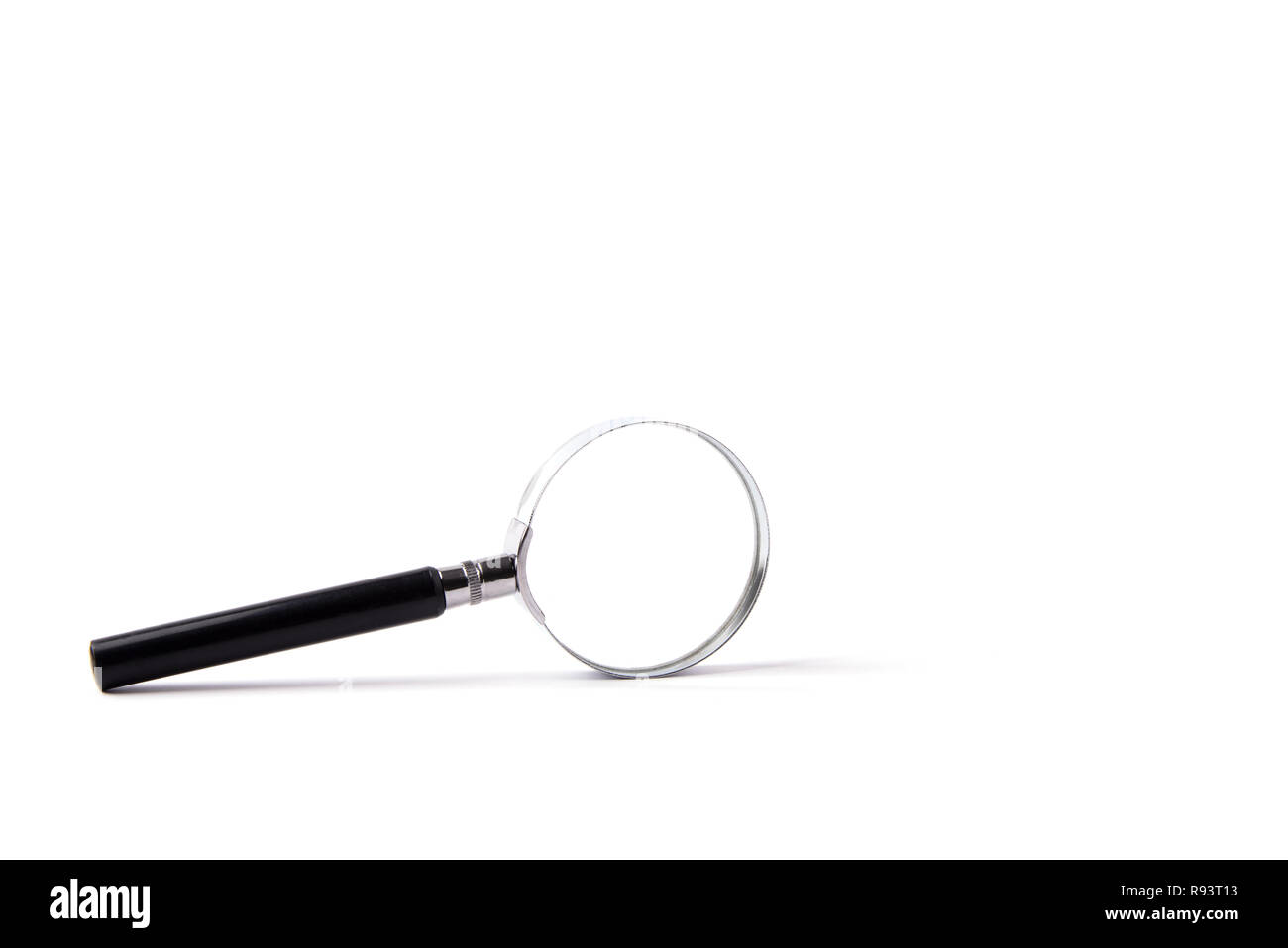 Isolated magnifying glass on white Stock Photo