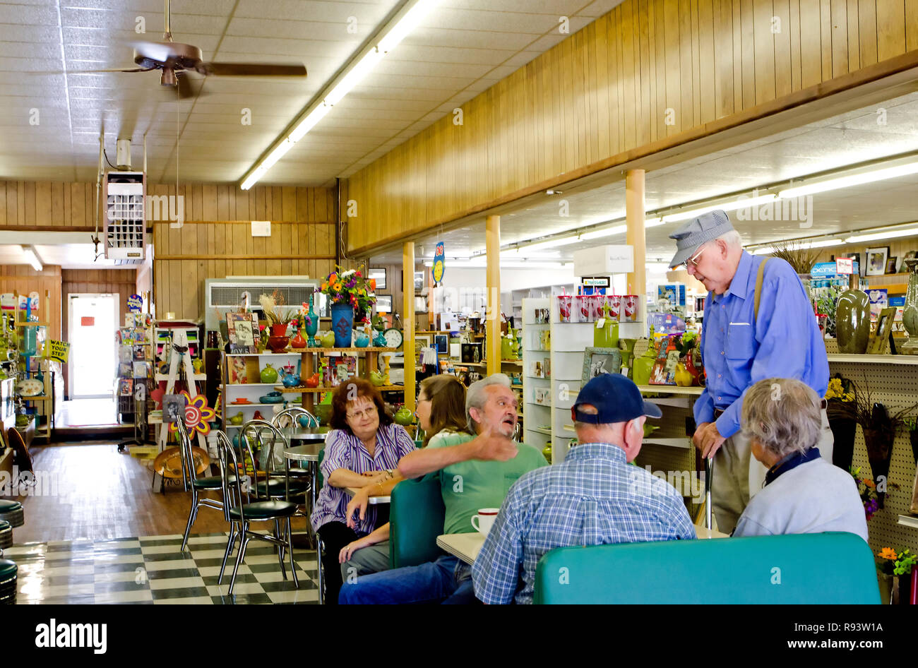 Customers talk and eat at Turnage Drug Store in Water Valley, Mississippi. Stock Photo