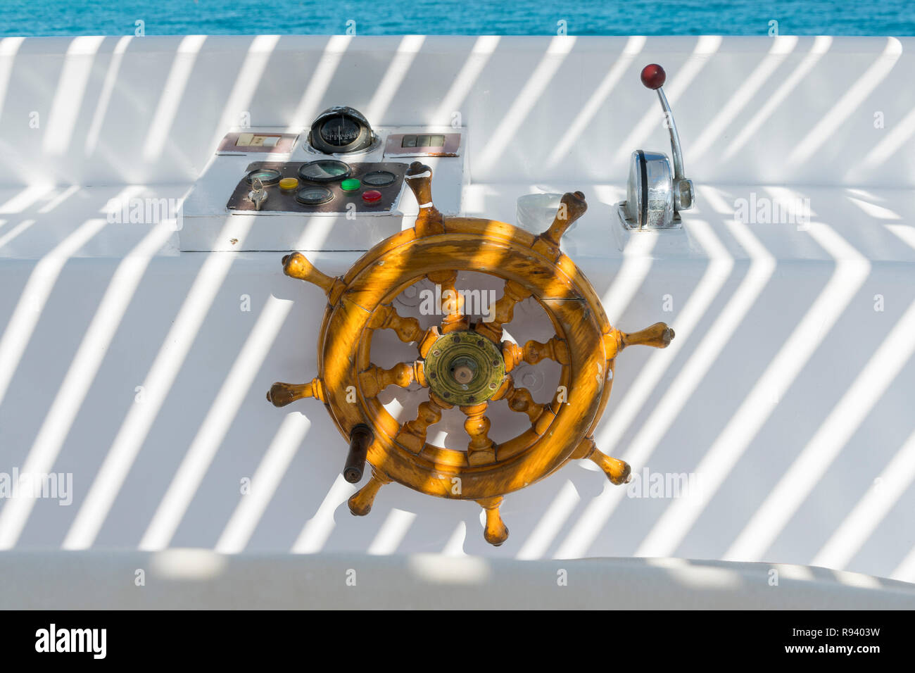 Wooden ship&rsquo;s steering wheel. The yacht&rsquo;s steering wheel. The yacht&rsquo;s