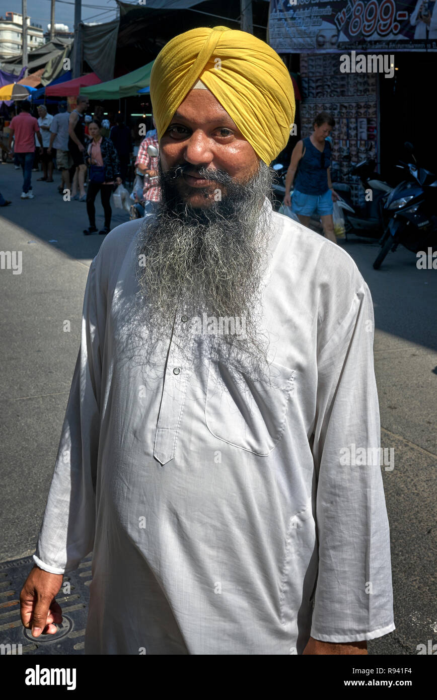 Indian Sikh. Portrait of an Indian Sikh man in traditional Kurta pajama shirt and turban headwear Stock Photo