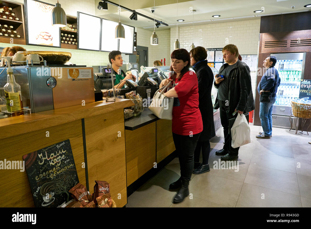 SAINT PETERSBURG, RUSSIA - CIRCA OCTOBER, 2017: the queue for Starbucks Coffee at Pulkovo Airport Stock Photo