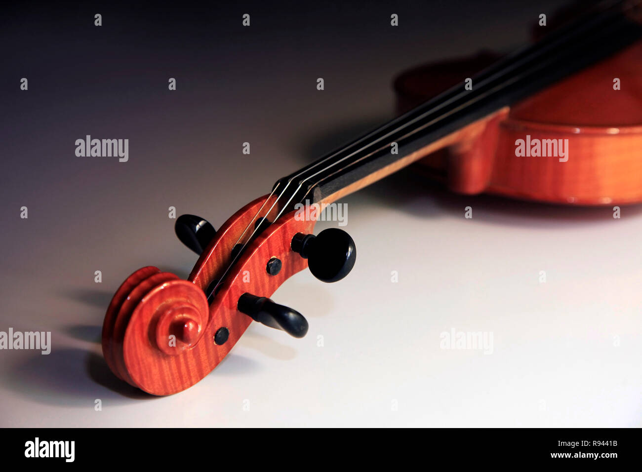 1937 old violin on the dim background Stock Photo