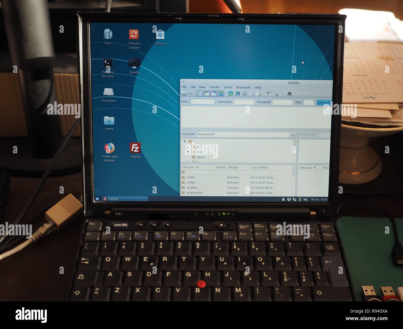 LONDON, UK - CIRCA 2018: Vintage IBM ThinkPad X41 laptop pc with Xubuntu. A lightweight operating system brings new life to perfectly working old comp Stock Photo
