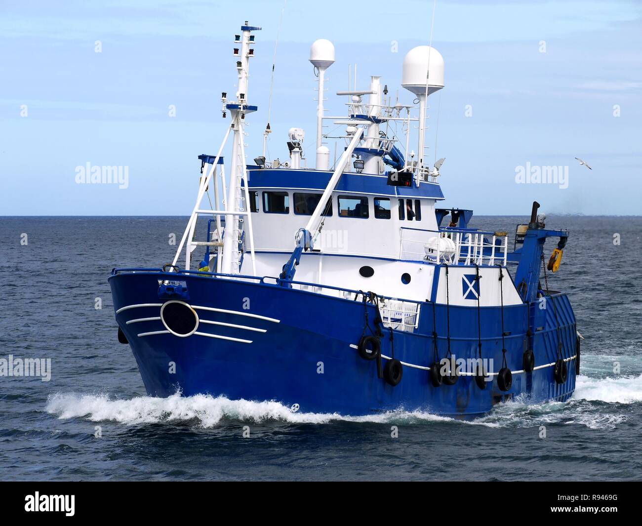 Blue Fishing Vessel Stock Photo - Alamy