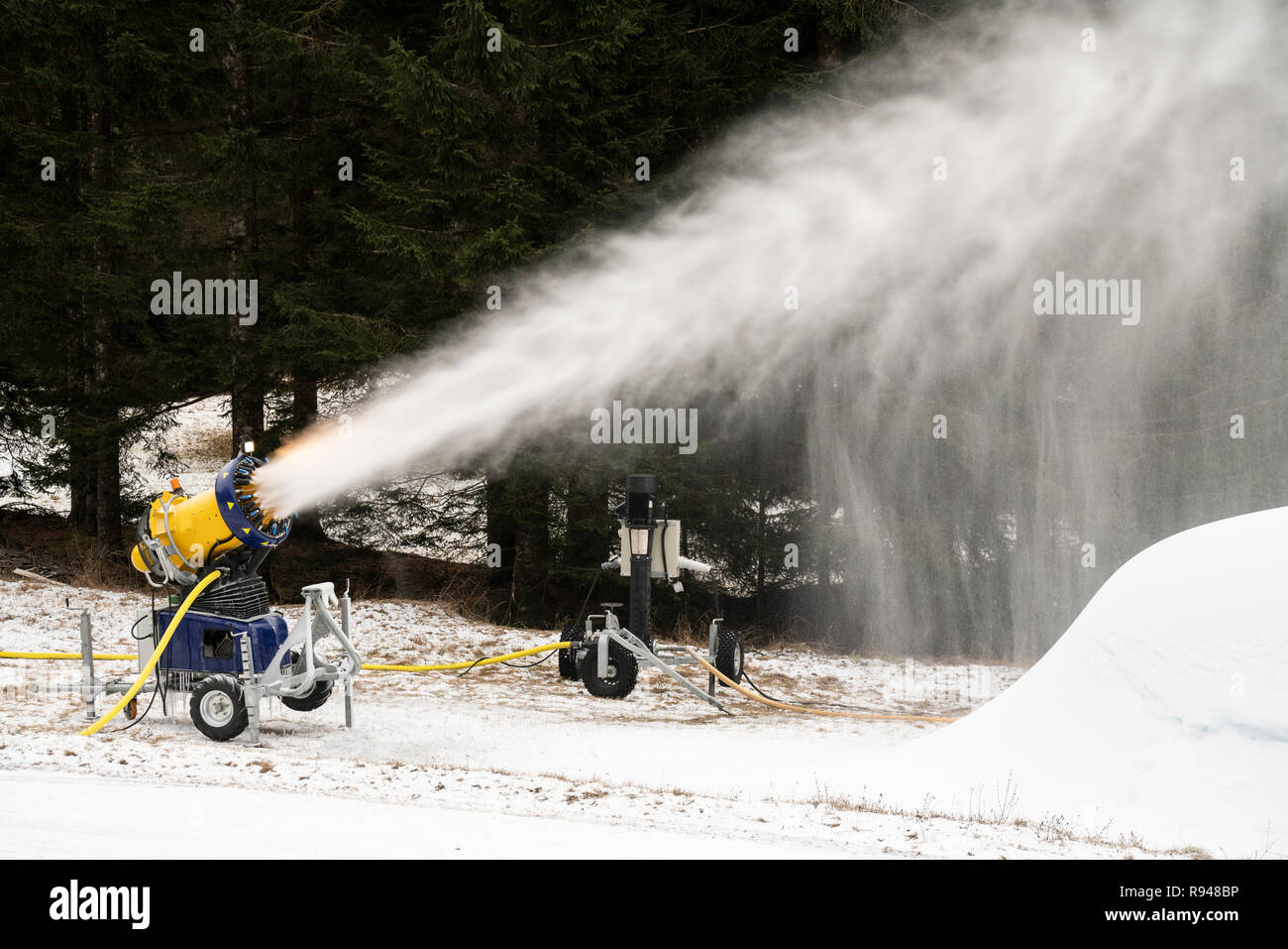 snow cannon in action Stock Photo Alamy