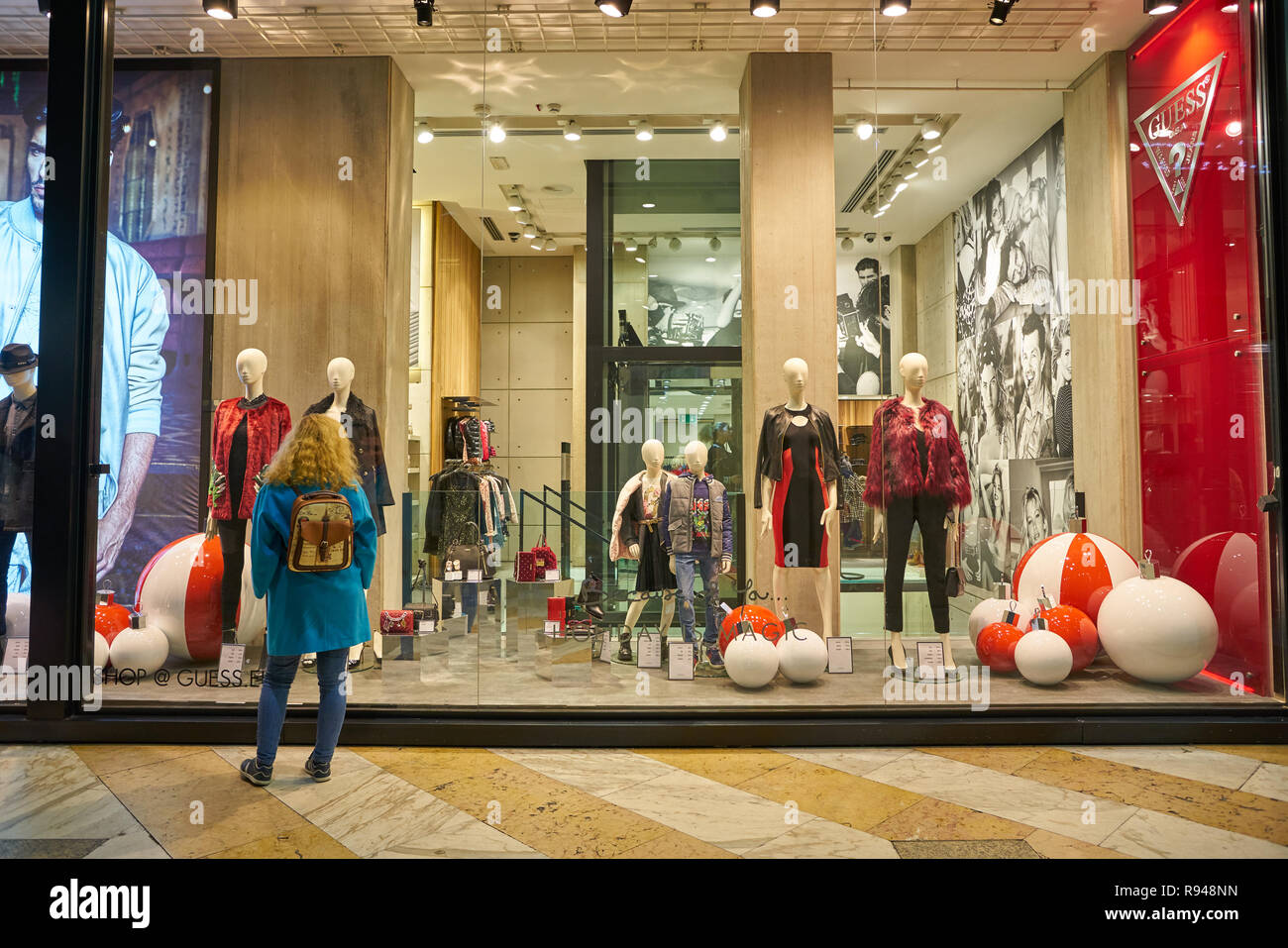MILAN, ITALY - CIRCA NOVEMBER, 2017: window display at Guess store in Milan.  Guess is an American clothing brand and retailer Stock Photo - Alamy