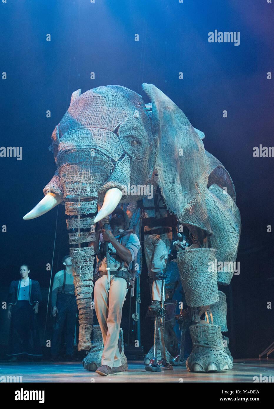 Performers operate an elephant puppet during a photocall ahead of the