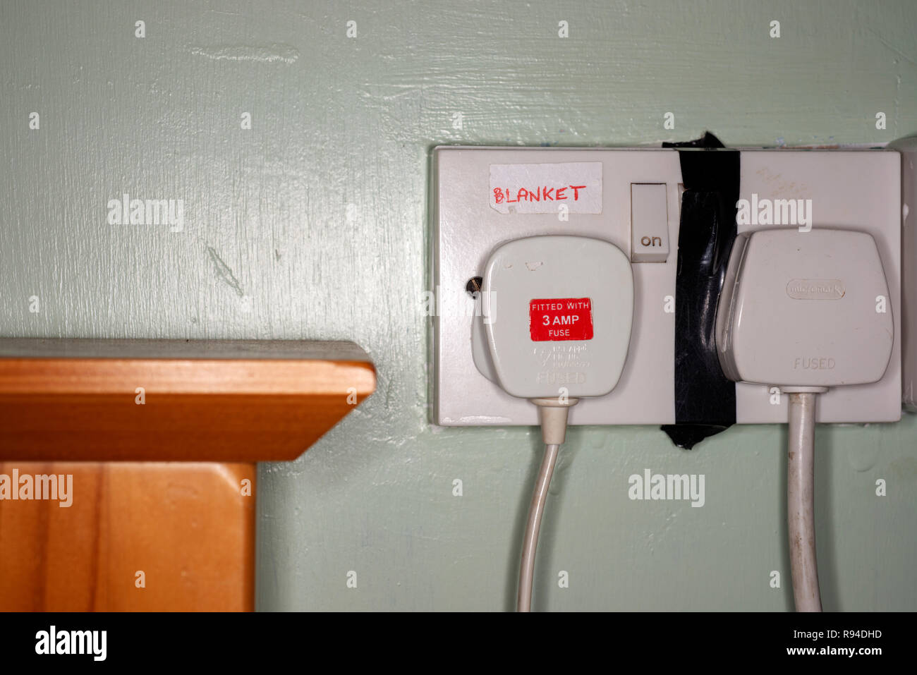 Double electric bedroom sockets Stock Photo