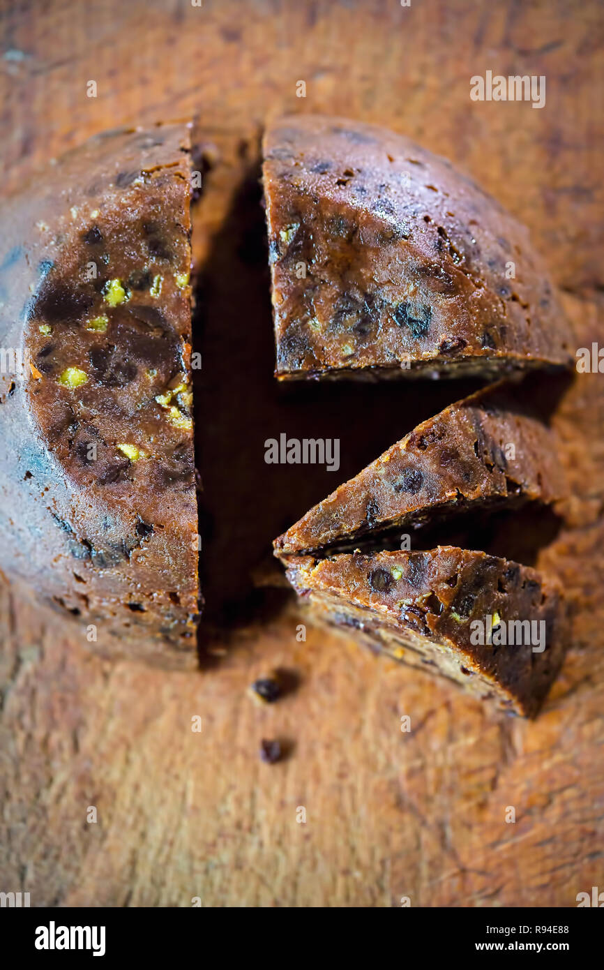 Christmas pudding on wooden board Stock Photo