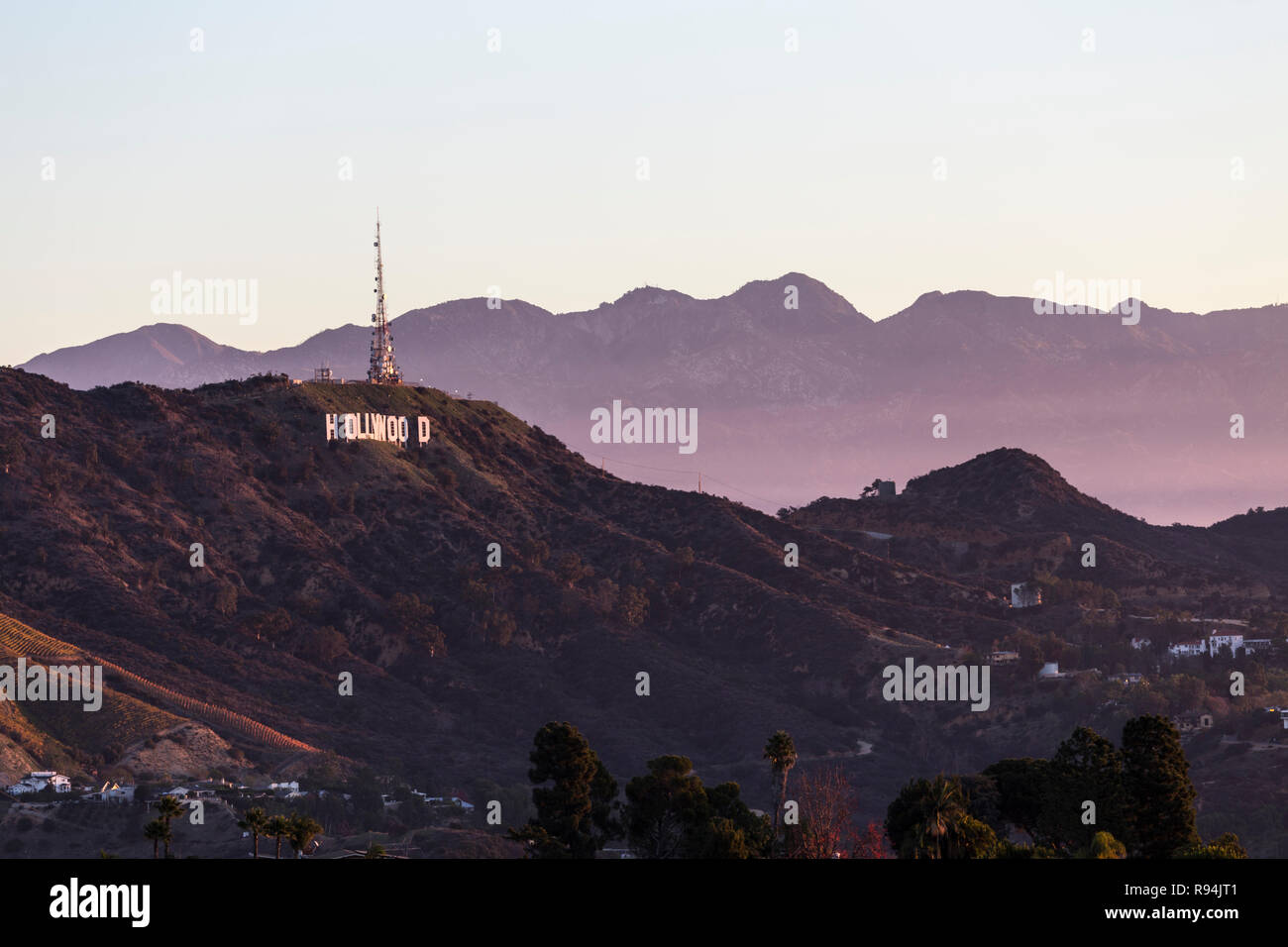 Los Angeles, California, USA - December 16, 2018:  The famous Hollywood Sign and Griffith Park with the San Gabriel Mountains in background. Stock Photo