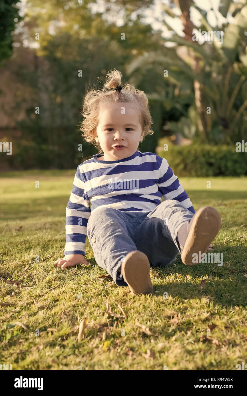 Small Baby Boy Or Cute Child With Happy Face And Blonde Hair In