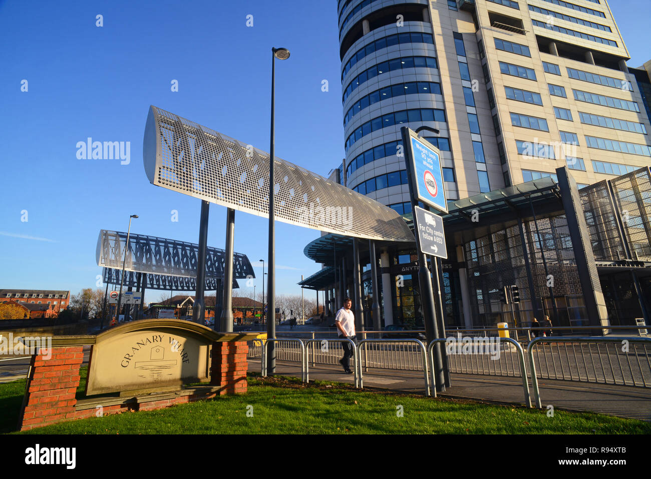 giant wings erected to protect pedestrians and vehicles from dangerous wind tunnel effects caused by the size of bridgewater place building leeds uk Stock Photo