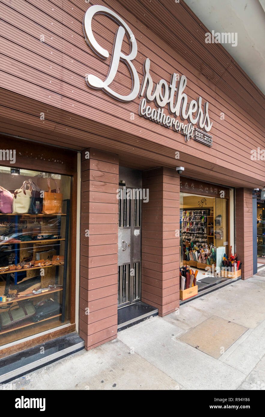 Brothers Leathercraft store, one of the new artisans bringing leather goods back to Tai Nan Street, Sham Shui Po, Kowloon, Hong Kong Stock Photo