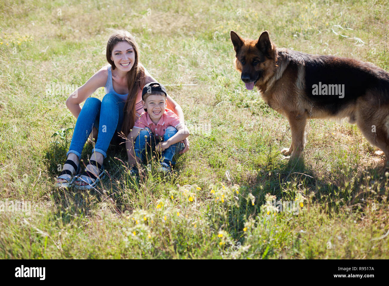 beautiful woman schools a German Shepherd Dog friend Stock Photo Alamy