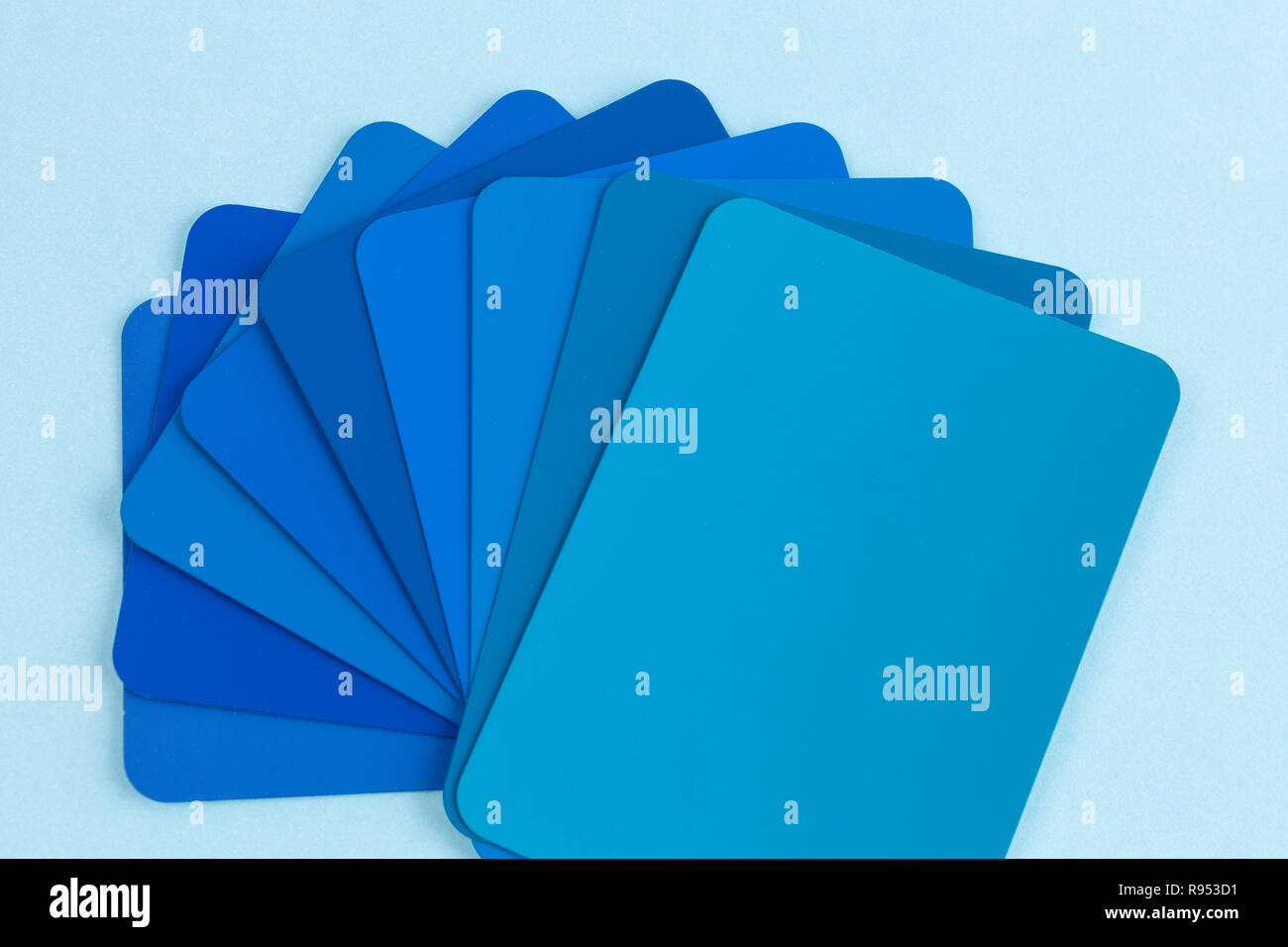 Color swatches sample cards spread in fan shape - hues of blue with copy space Stock Photo