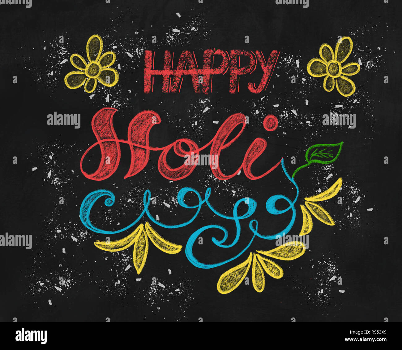 Colorful Happy Holi hand lettering on chalkboard Stock Photo