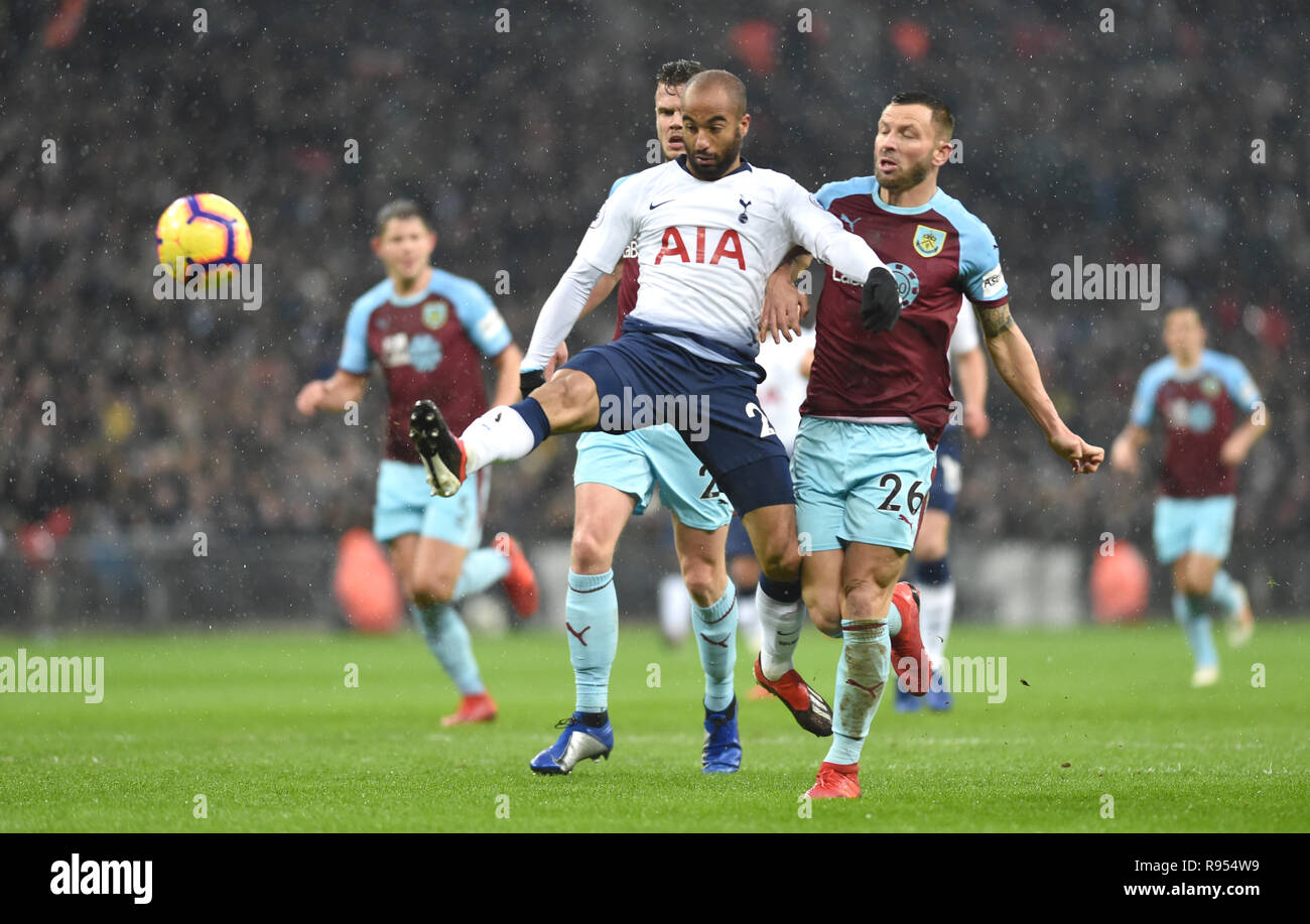 Lucas Moura of Spurs gets between Kevin Long and Phil Bardsley of Burnley to fire wide during the Premier League match between Tottenham Hotspur and Burnley at Wembley Stadium ,London , 15 December 2018 Editorial use only. No merchandising. For Football images FA and Premier League restrictions apply inc. no internet/mobile usage without FAPL license - for details contact Football Dataco Stock Photo