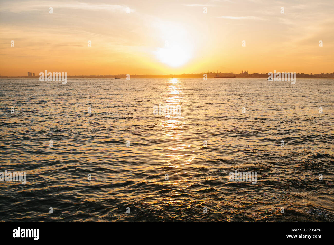 A beautiful sunset view of the Bosphorus in and the city of Istanbul in ...