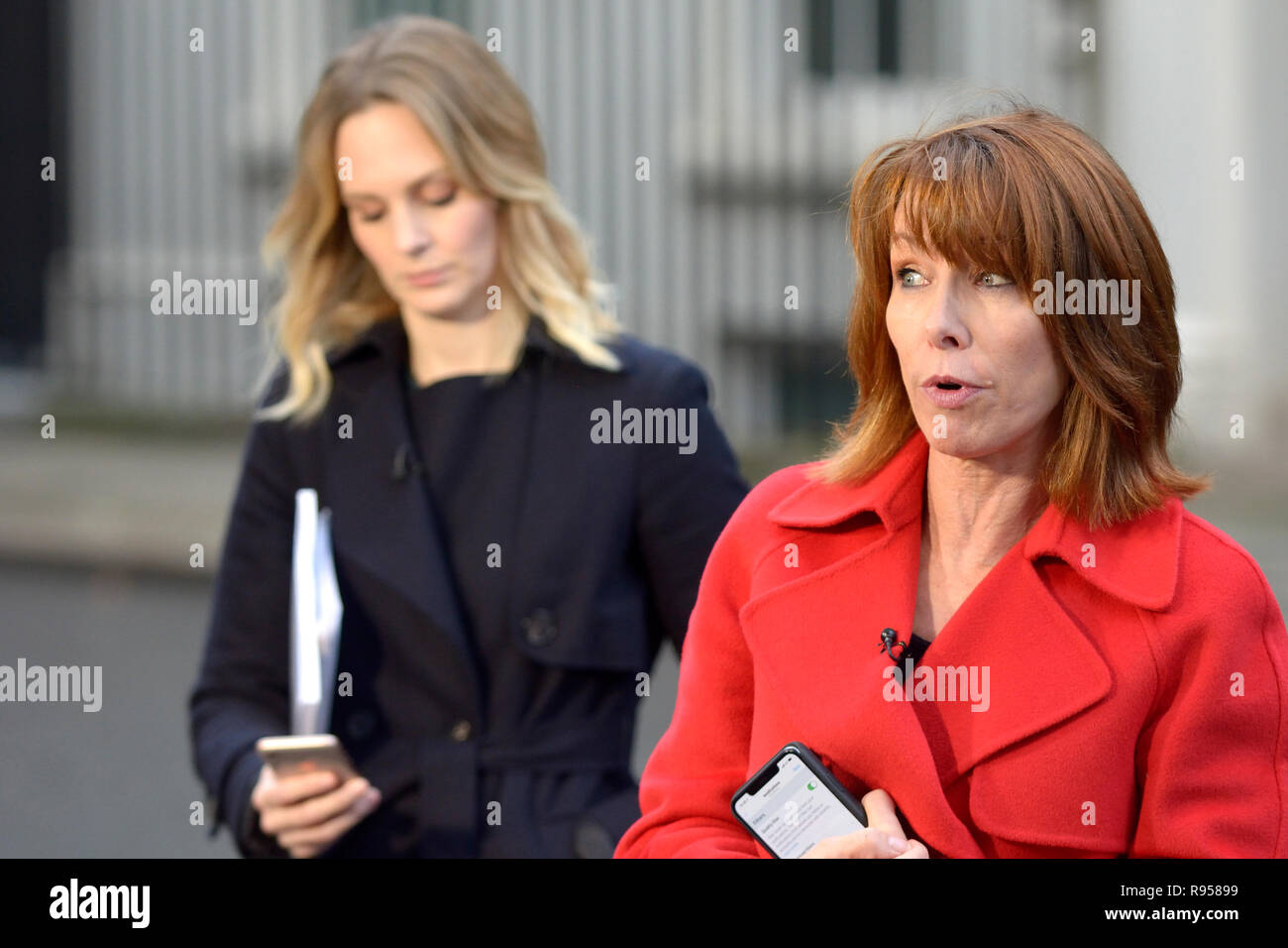 Kay Burley (SKY News presenter) with Kate McCann (reporter) reporting live from Downing Street, December 2018 Stock Photo