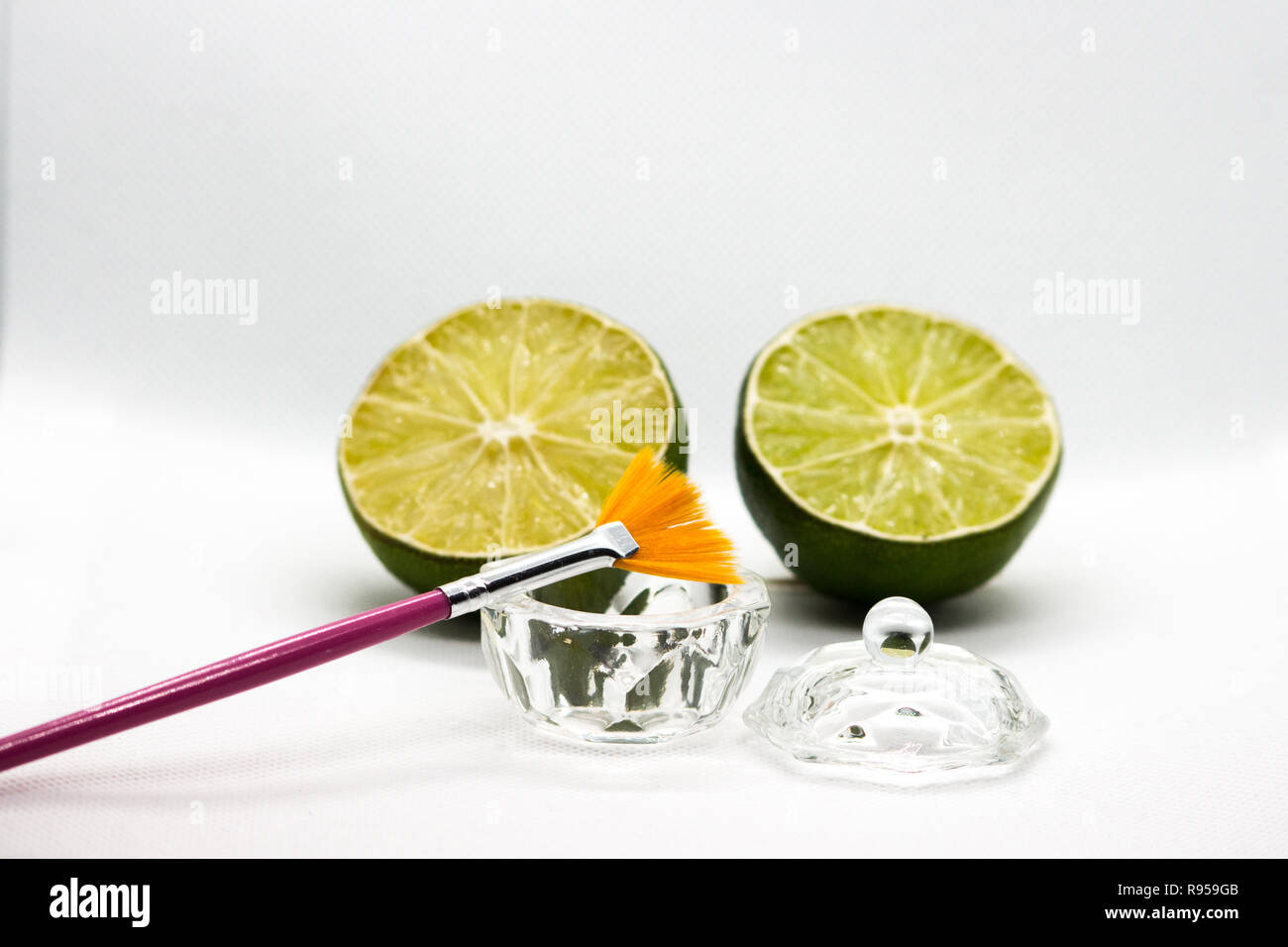 AHA fruit acids. Peeling fruit acid for the face, cosmetic brush, citrus fruits. Facial peeling