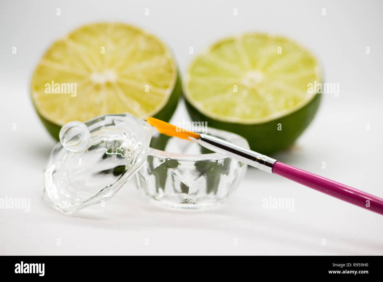 AHA fruit acids. Peeling fruit acid for the face, cosmetic brush, citrus fruits. Facial peeling