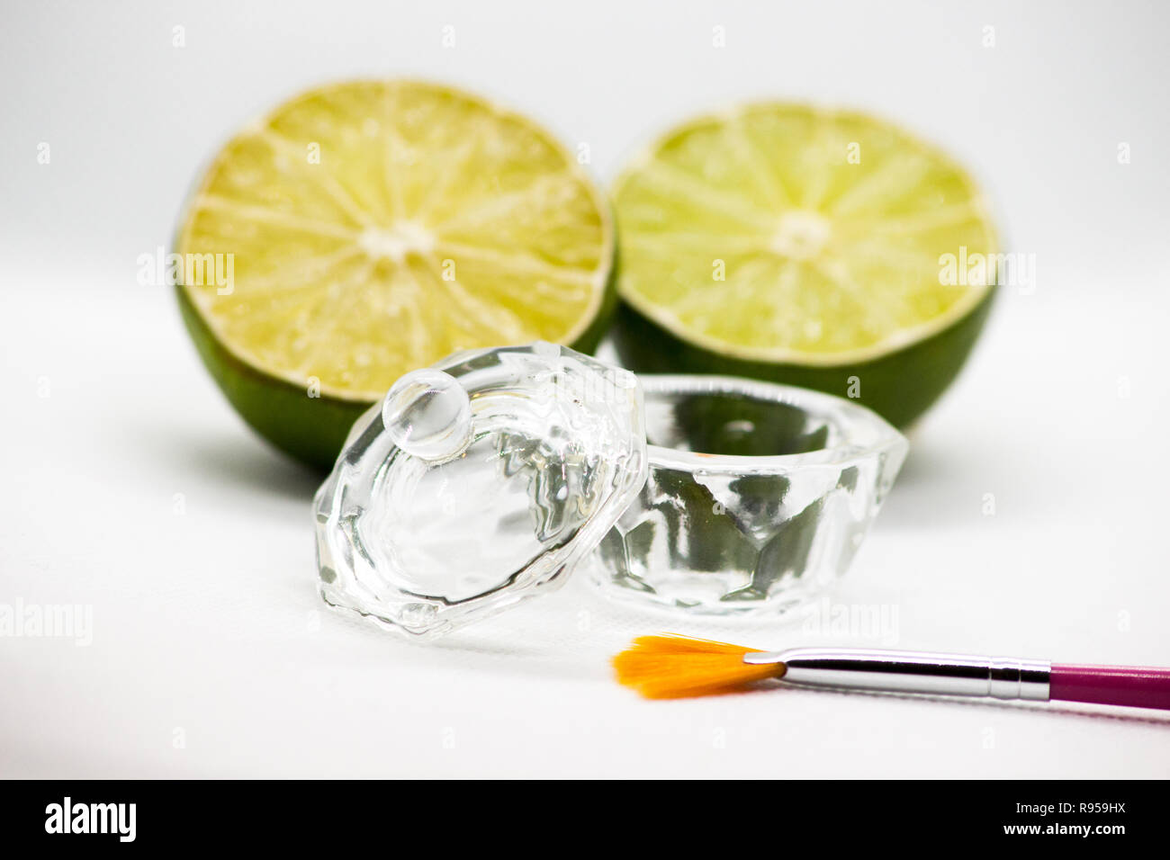 AHA fruit acids. Peeling fruit acid for the face, cosmetic brush, citrus fruits. Facial peeling