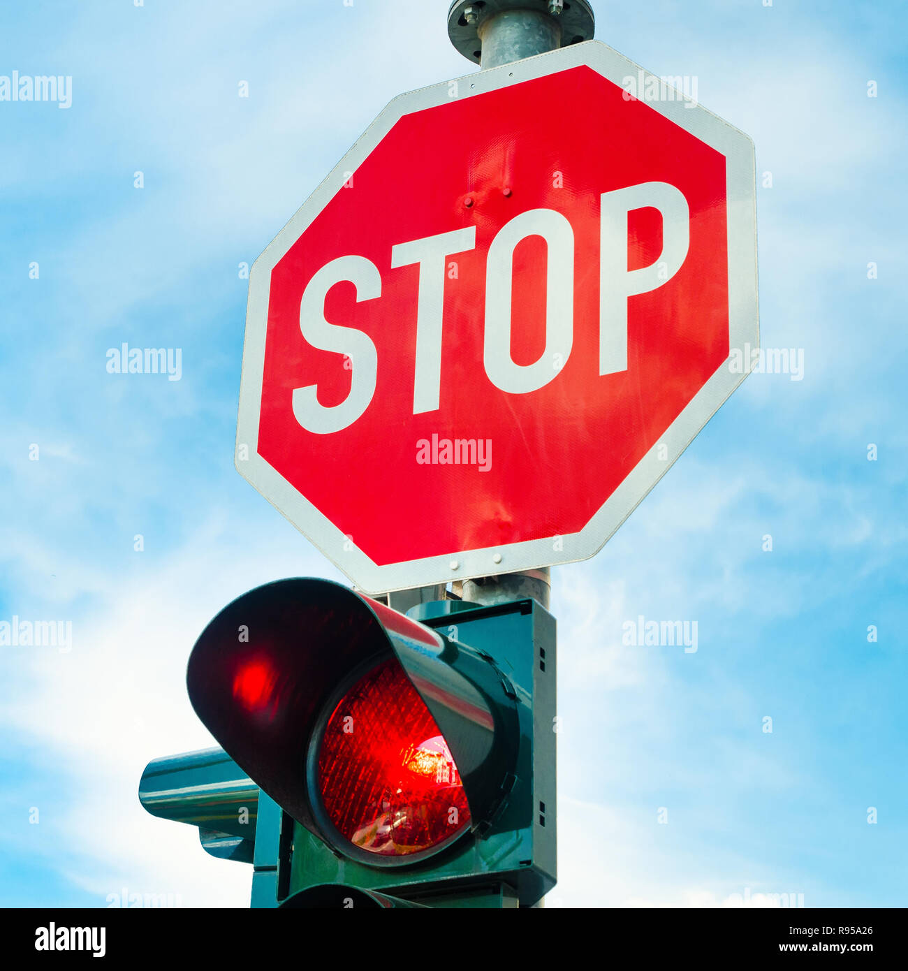 stop sign with red traffic light Stock Photo Alamy