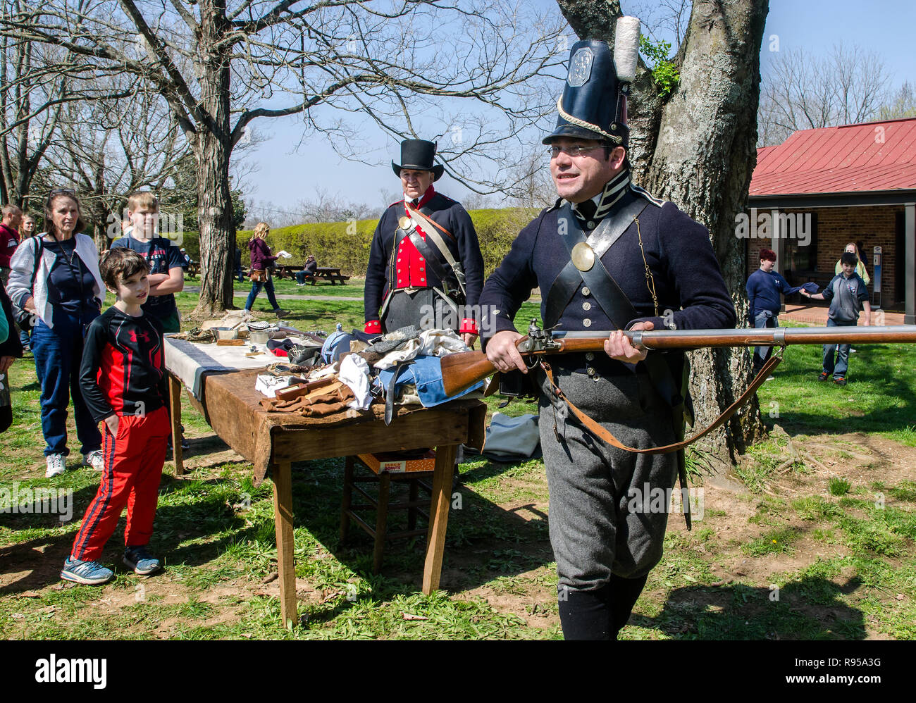 History reenactor Myers Brown, portraying an 1812 U.S. Regular Army soldier, demonstrates a model 1795 musket in Nashville, Tennessee. Stock Photo