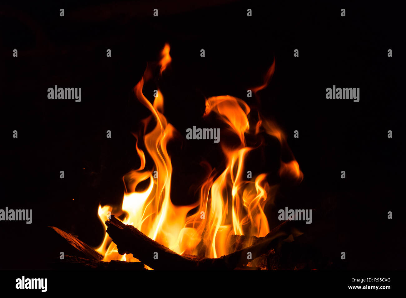 bonfire, fire flames on black background - Stock Photo