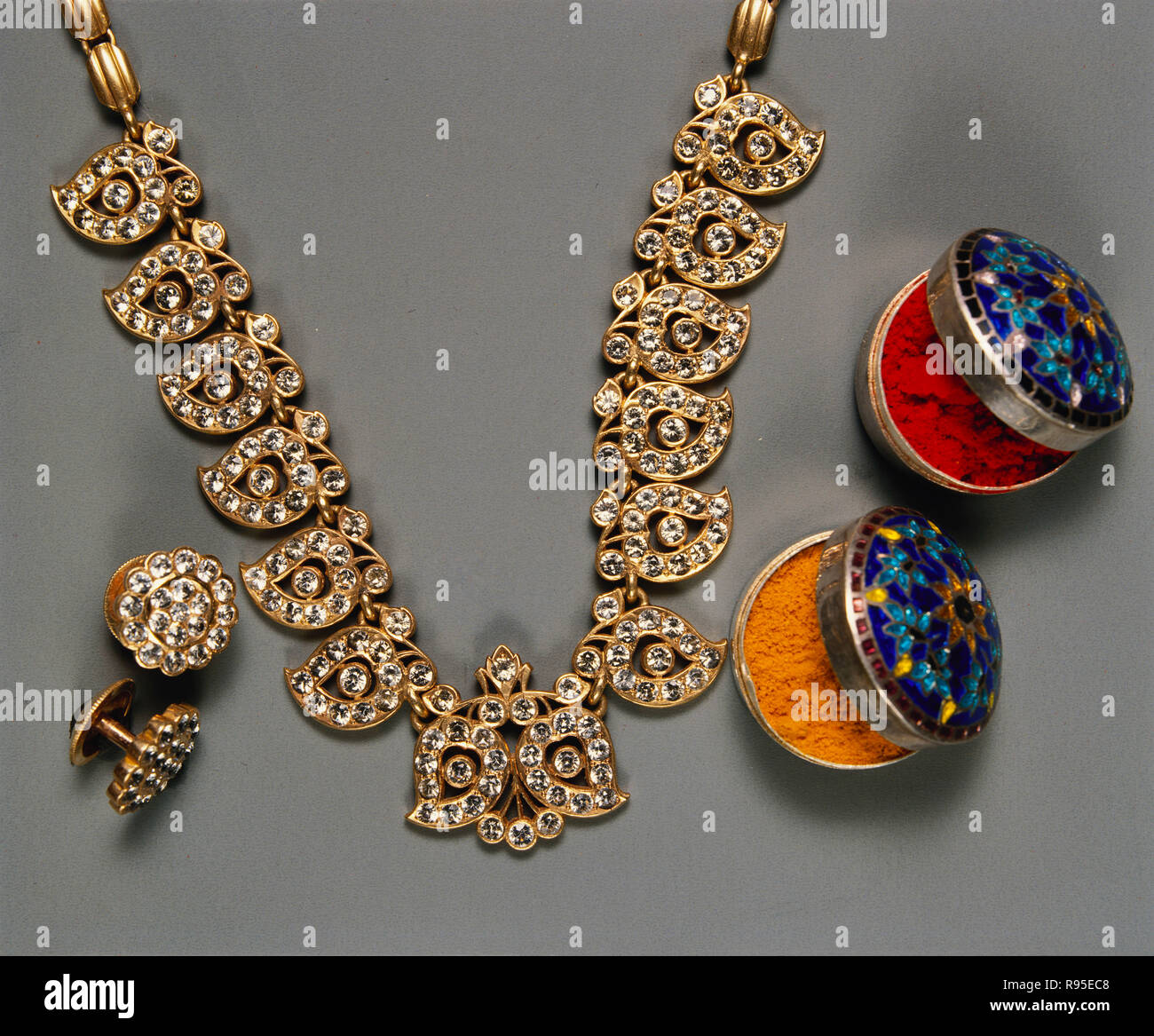 Necklace with small diamonds Earrings set and haldi kumkum pot Stock Photo