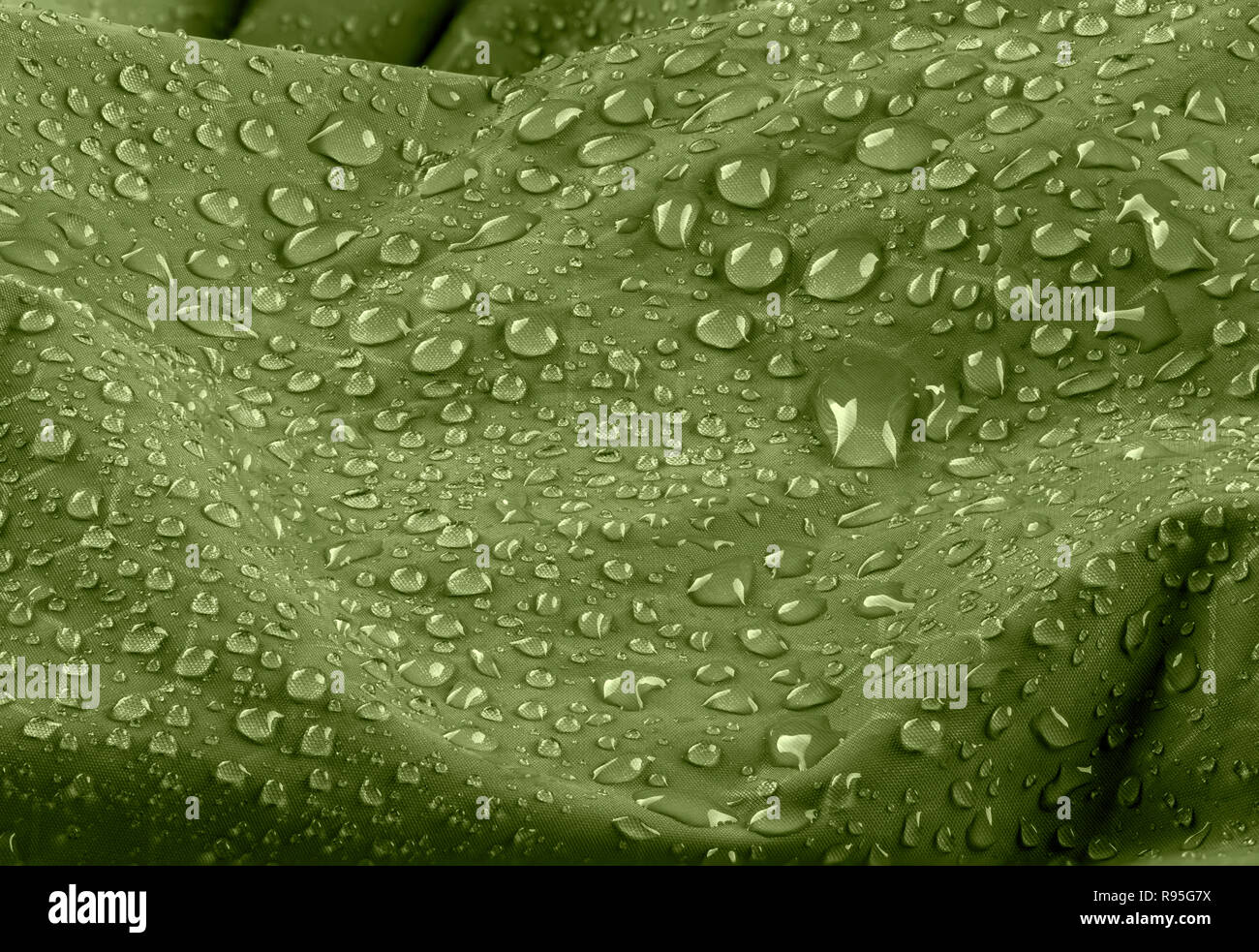 Water Drops On Waterproof Green Nylon Fabric Macro Detail View Of Texture Of Woven Synthetic Waterproof Clothing Waterproof Fabric With Waterdrops Stock Photo Alamy