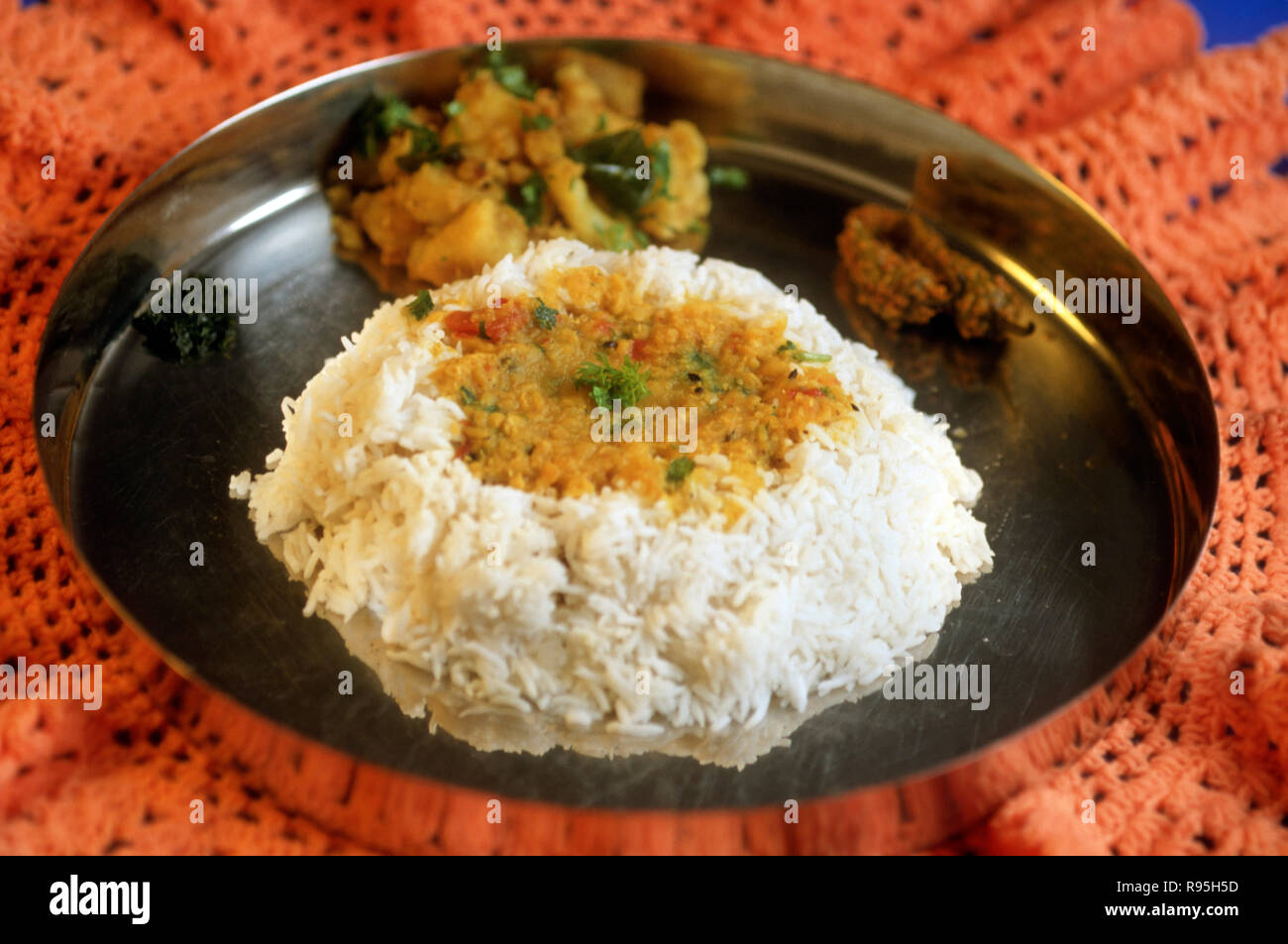 Dal rice vegetable and pickle in thali Stock Photo Alamy