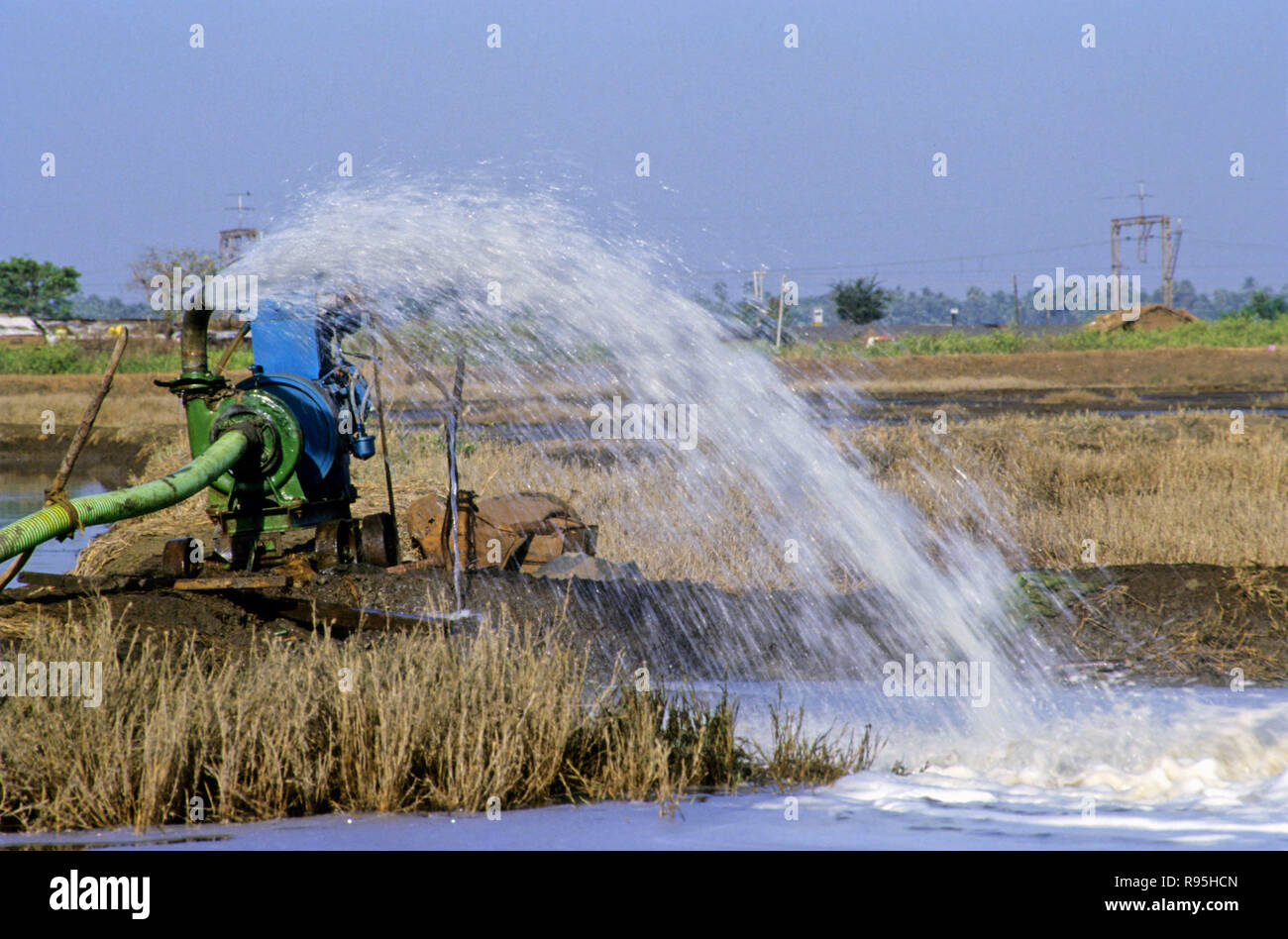 Water pump in fields throwing water, Varanasi, Uttar Pradesh, India