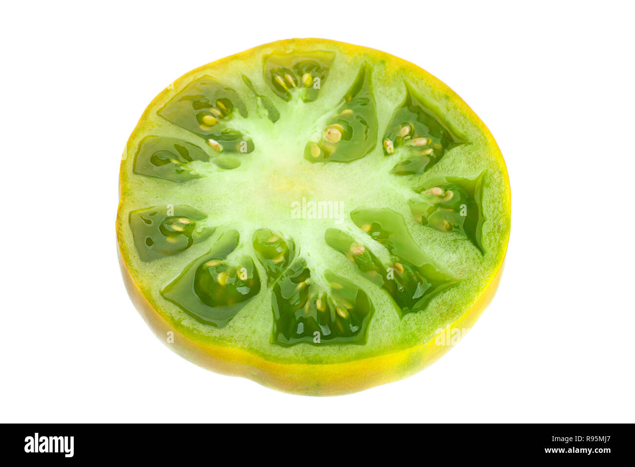 Green ripe tomatoes "Magic Glow" isolated on white Stock Photo - Alamy