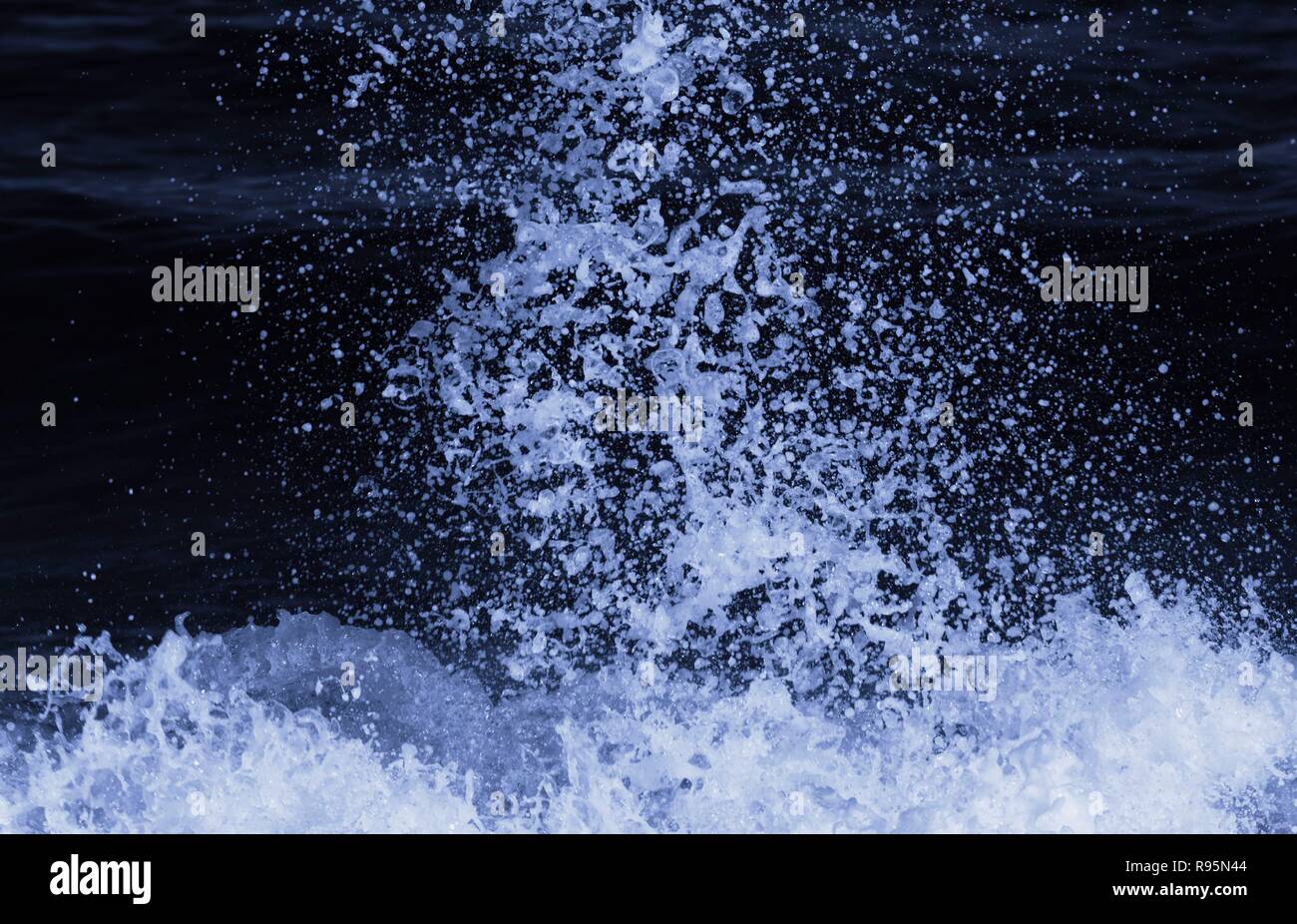 Breaking wave abstracted in post-processing. Stock Photo