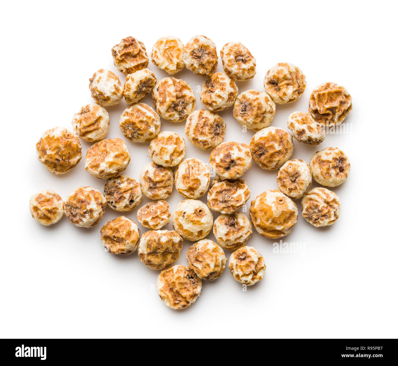 Tiger nuts. Tasty chufa nuts. Healthy superfood isolated on white