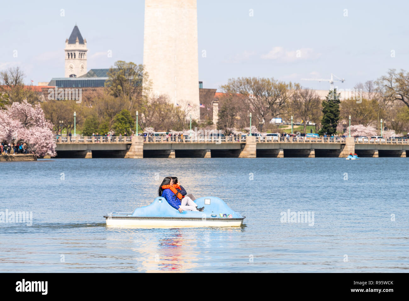 Washington DC, USA April 5, 2018 Asian Chinese tourists, people couple riding pedal boat