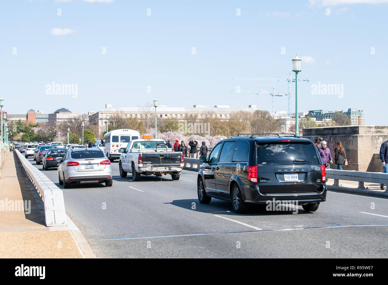 Washington DC, USA April 5, 2018 People walking by road on Kutz