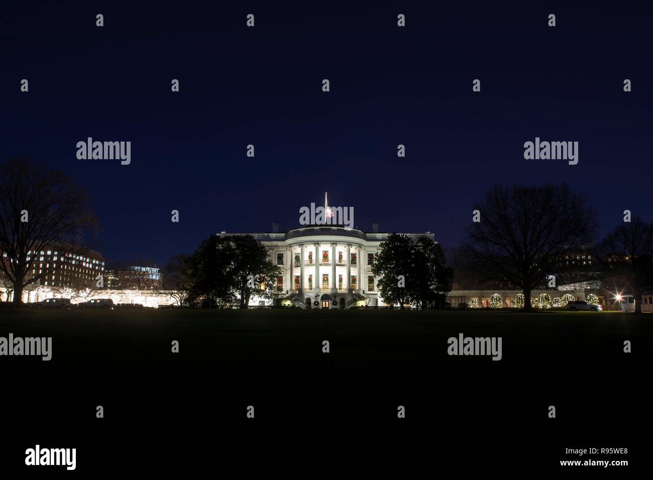 The south side of the White House decorated for Christmas and lighted at night December 12, 2018 in Washington, DC. Stock Photo