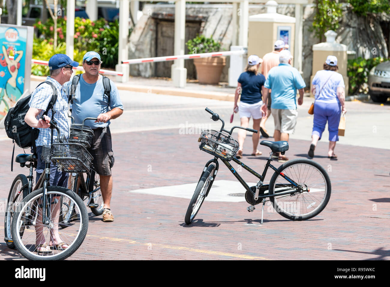 Key West, USA May 1, 2018 People standing on street, tourists with