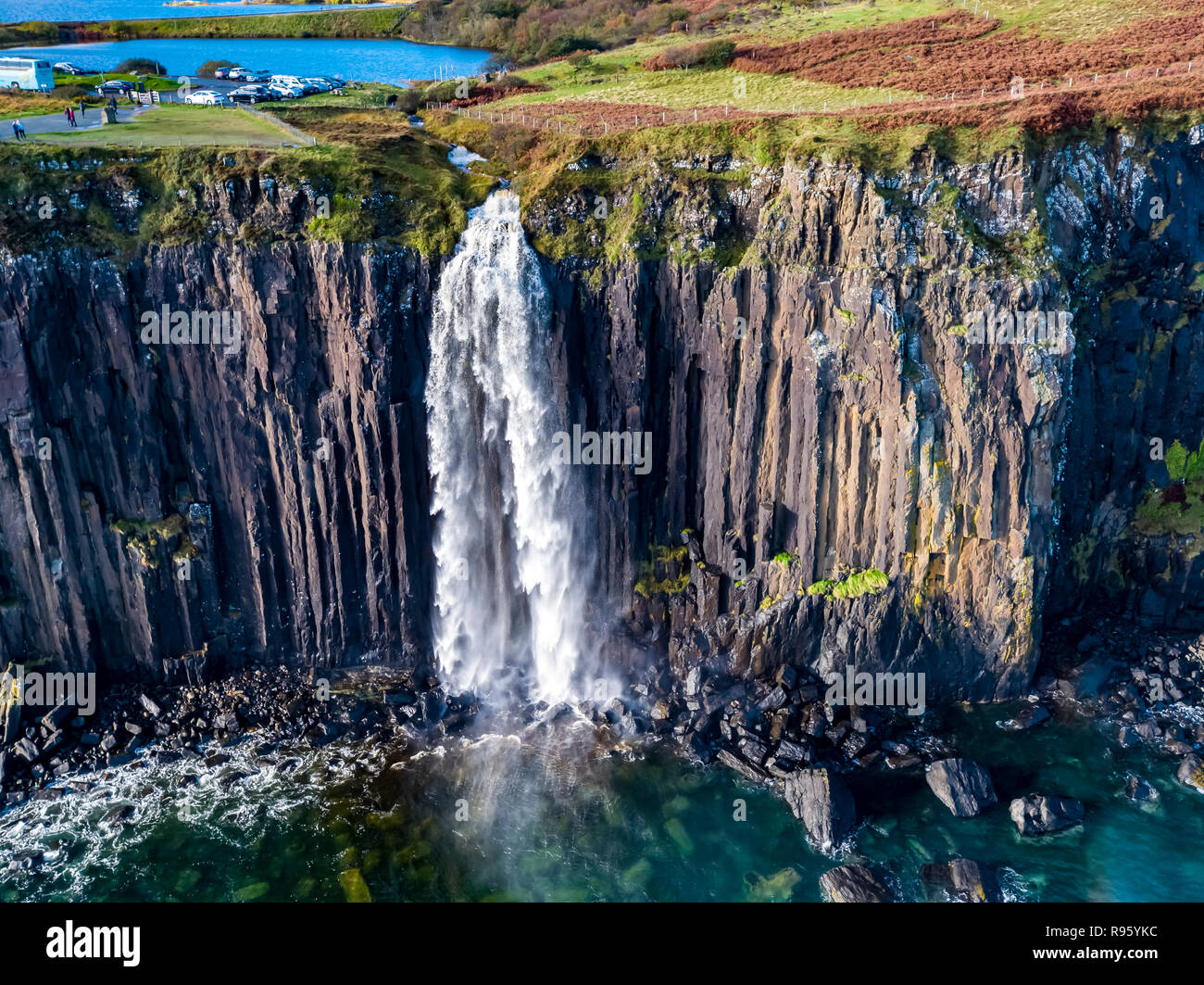 Aerial view of the dramatic coastline at the cliffs by Staffin with the famous Kilt Rock waterfall - Isle of Skye - Scotland. Stock Photo