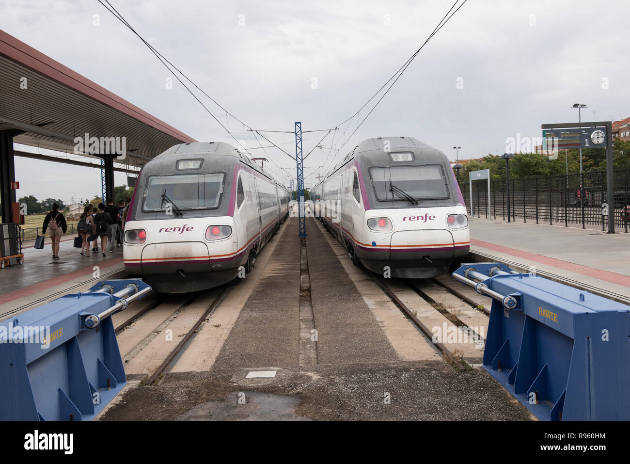 A local metro transportation is seen on this picture. Metro railway is one of the most popular forms of transportation in Spain. The railway tracks ar Stock Photo